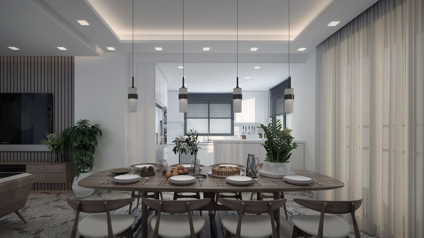 Dining table with chairs under a row of pendant lights